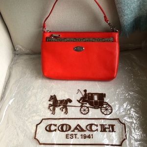 Coach X Grain Leather shoulder or wristlet bag.